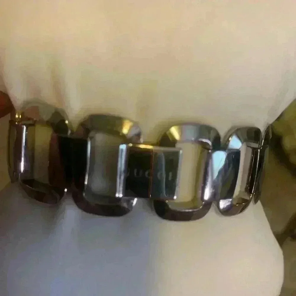 Gucci G watch Silver with Dark Bronze Face With Diamonds.